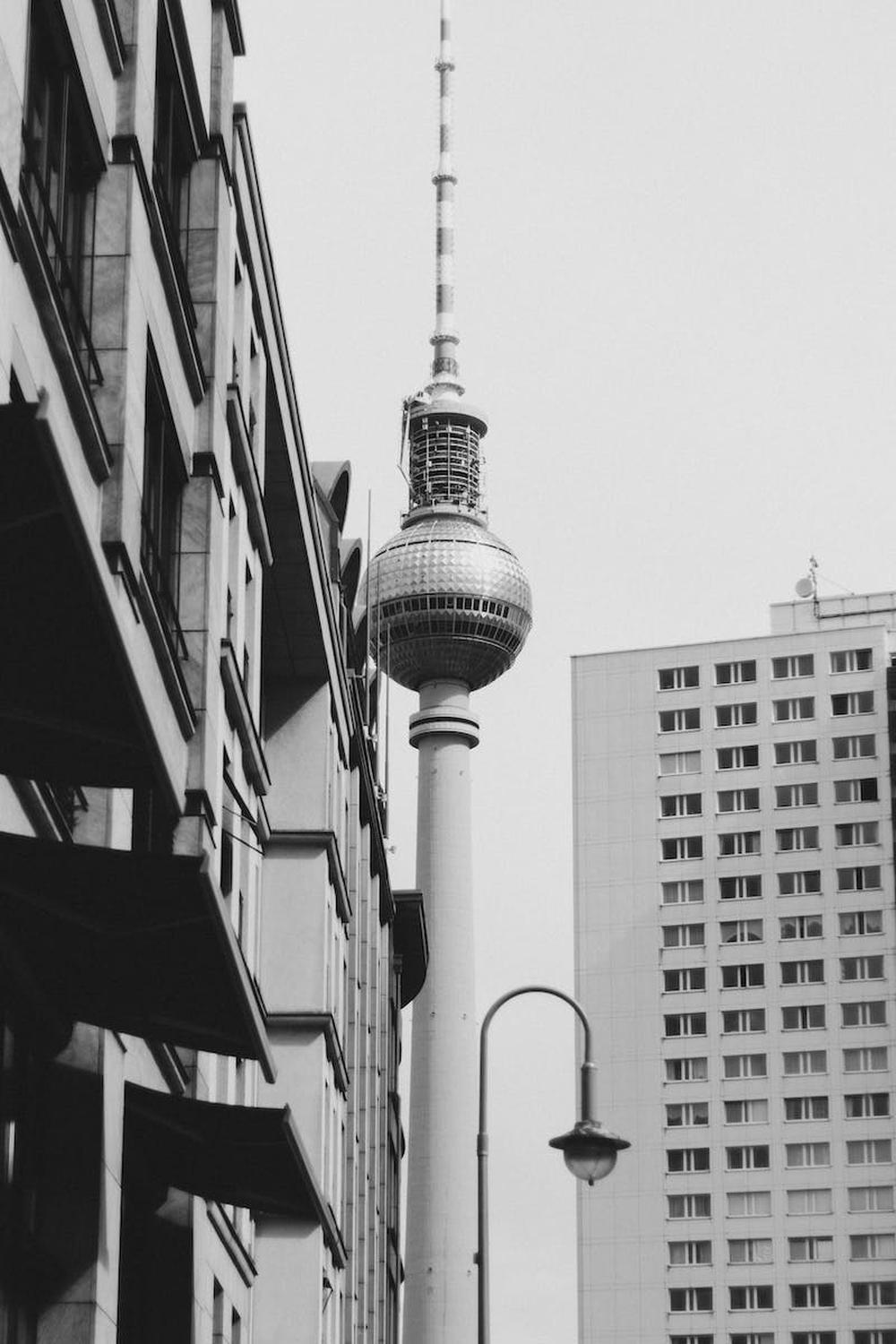 grayscale_photo_of_berliner_fernsehturm_tower_in_b